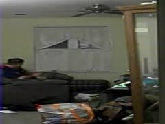 A concealed camera shows a wife masturbating and lusting for sex while wearing black lingerie.